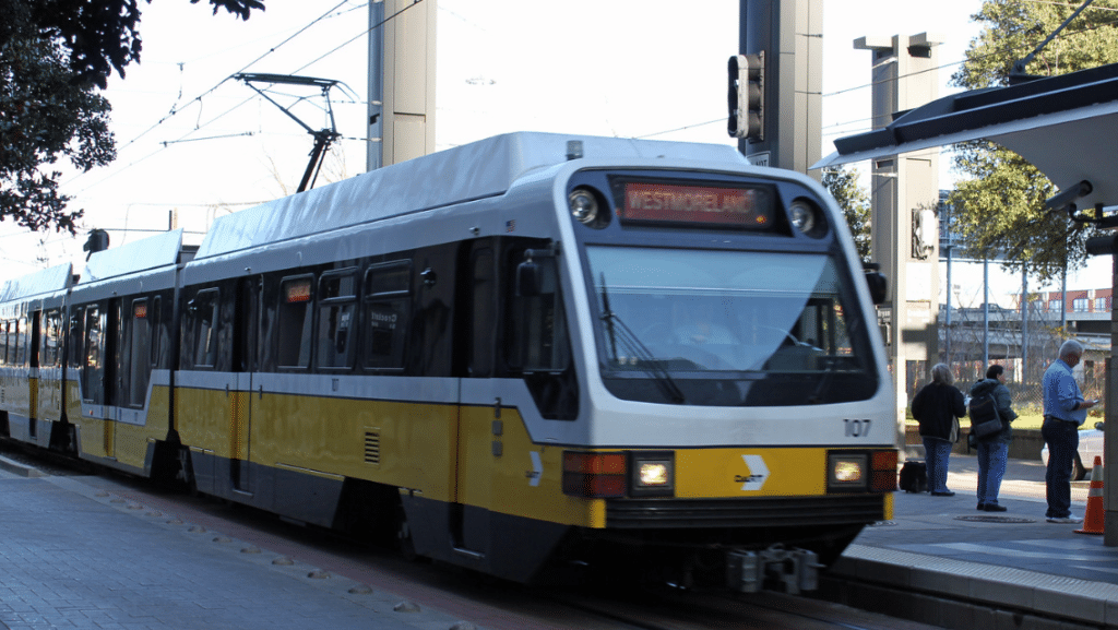DART light rail train DART light rail train stopped at a station platform